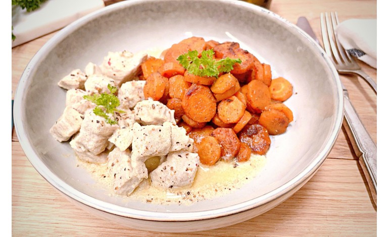 Sautéed veal with cream and fondant carrots with spices