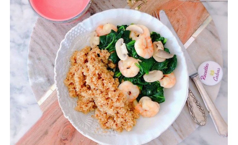 Sauteed prawns with quinoa curry, baby spinach and mushrooms